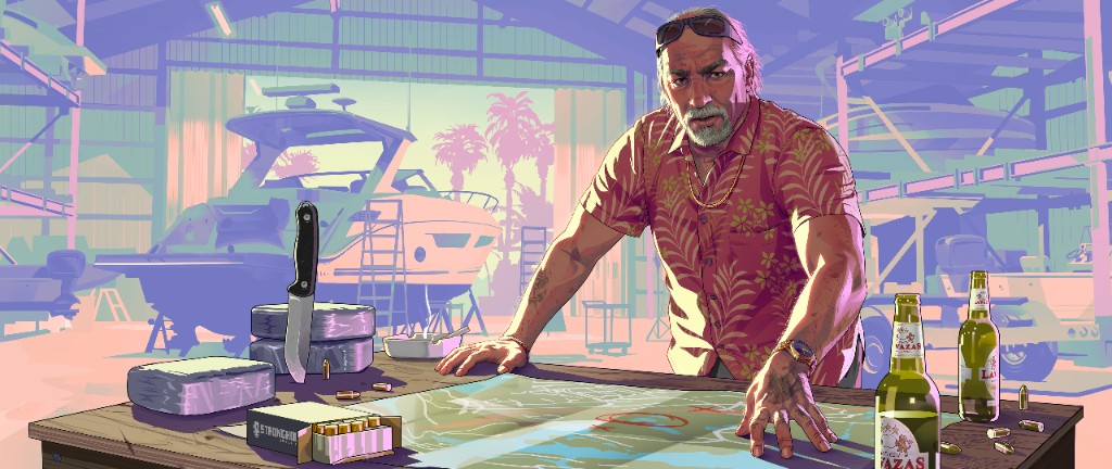 Brian Heder at a war-room table in a sunlit boat hangar